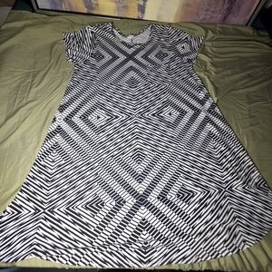 LuLaRoe Carly dress featuring a black and white geometric pattern.
